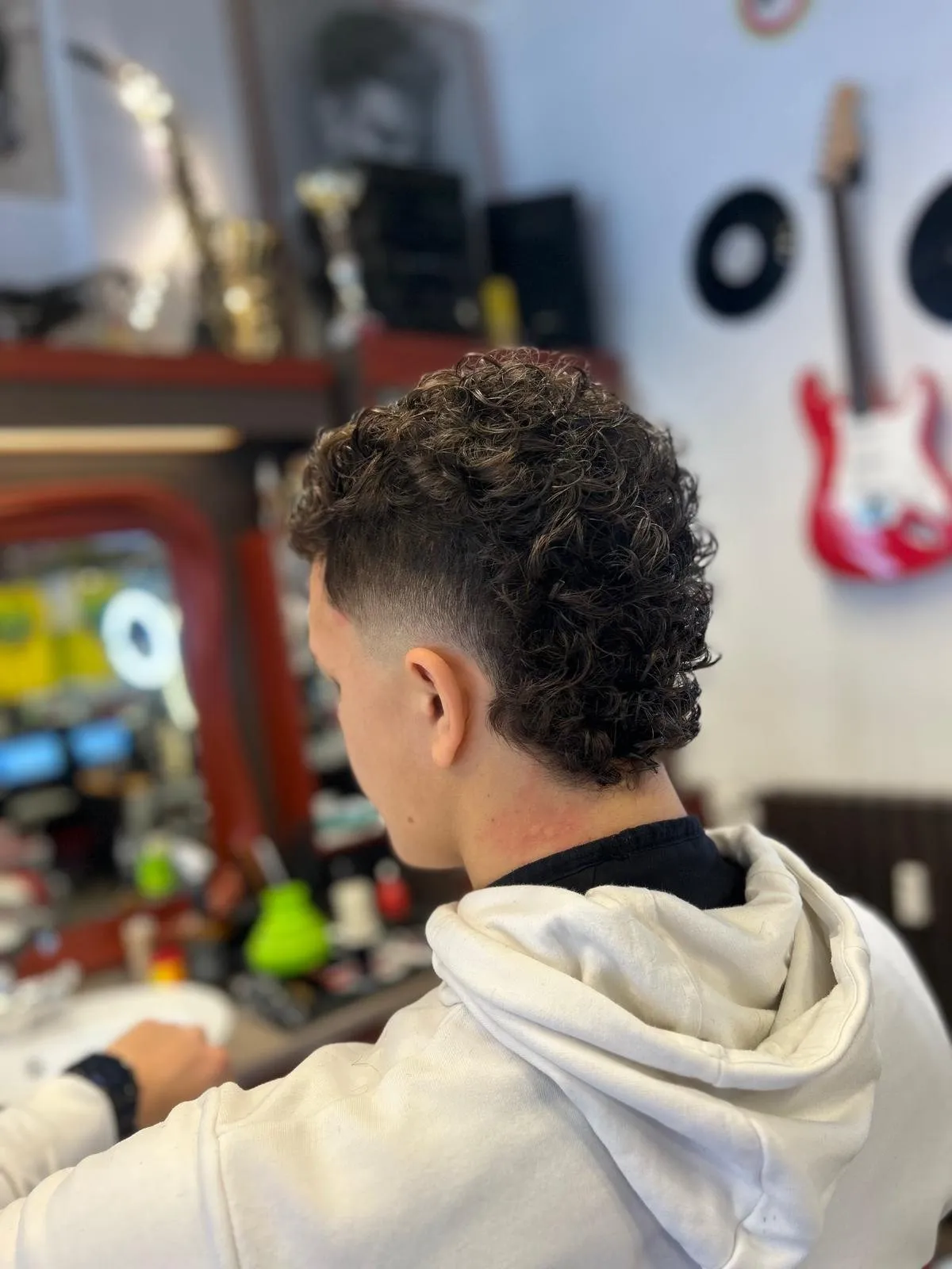 Taglio mullet su capelli ricci